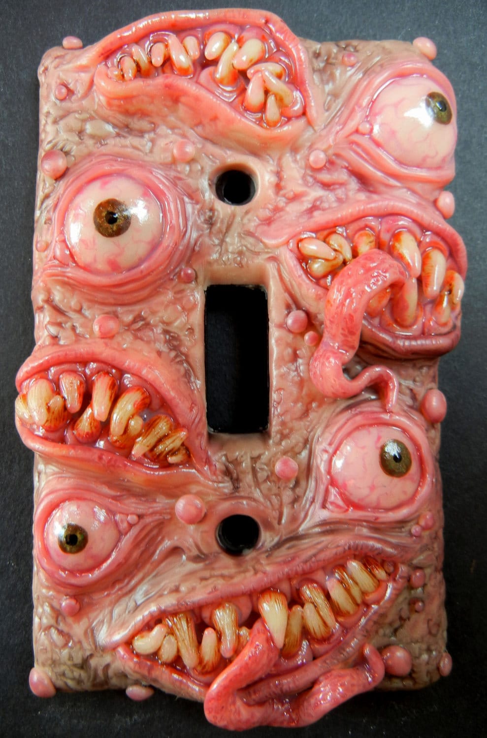 Grotesquely Impressive Monster Themed Light Switch Plates