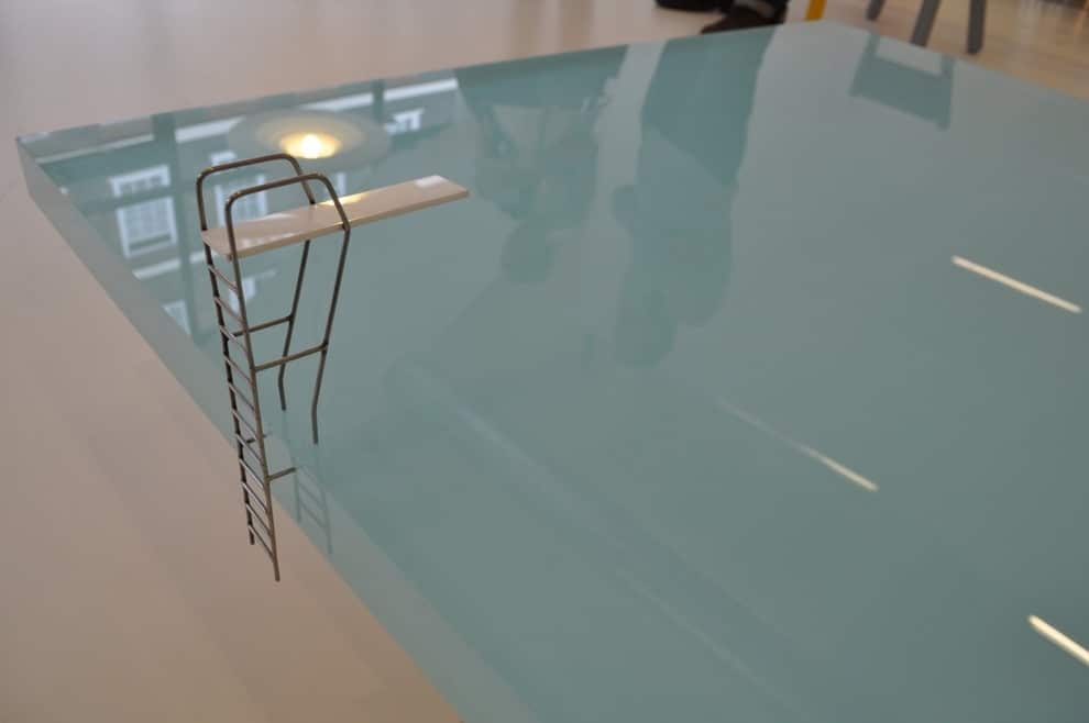 The Sleek & Stunning Swimming Pool Coffee Table Design