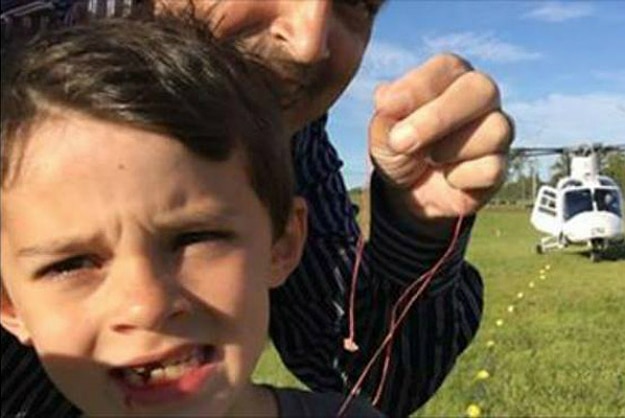 Dad Uses His Helicopter To Remove His Son’s Loose Tooth